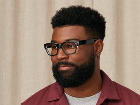 Model is wearing The ZOGAN in size 51 in Black Crystal