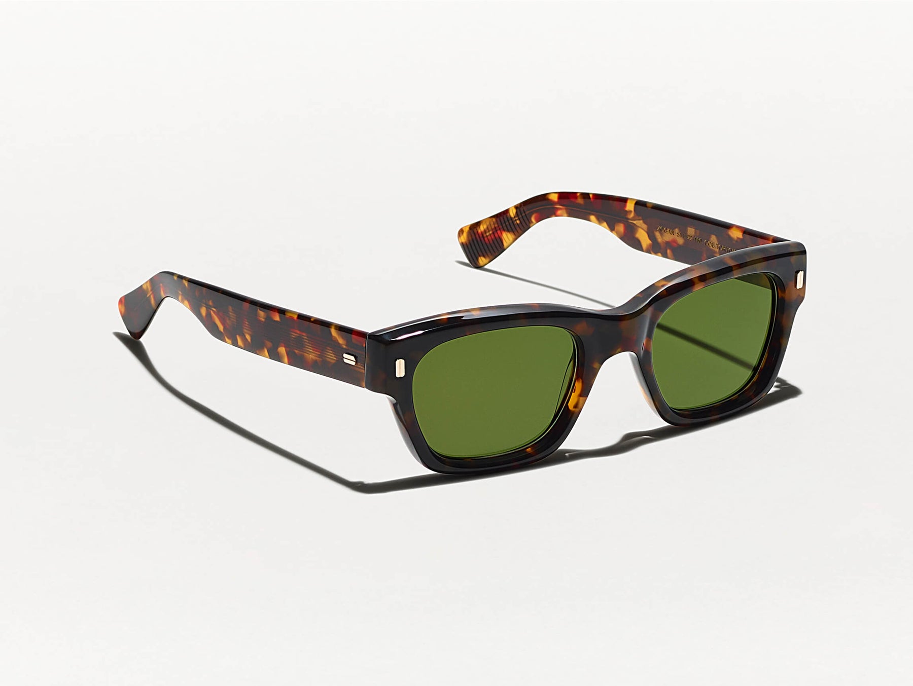 The ZOGAN SUN in Tortoise with CR-39 Green Lenses