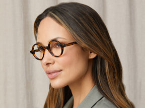 Model is wearing The ZOLMAN in Classic Havana in size 42 with Blue Protect Lenses