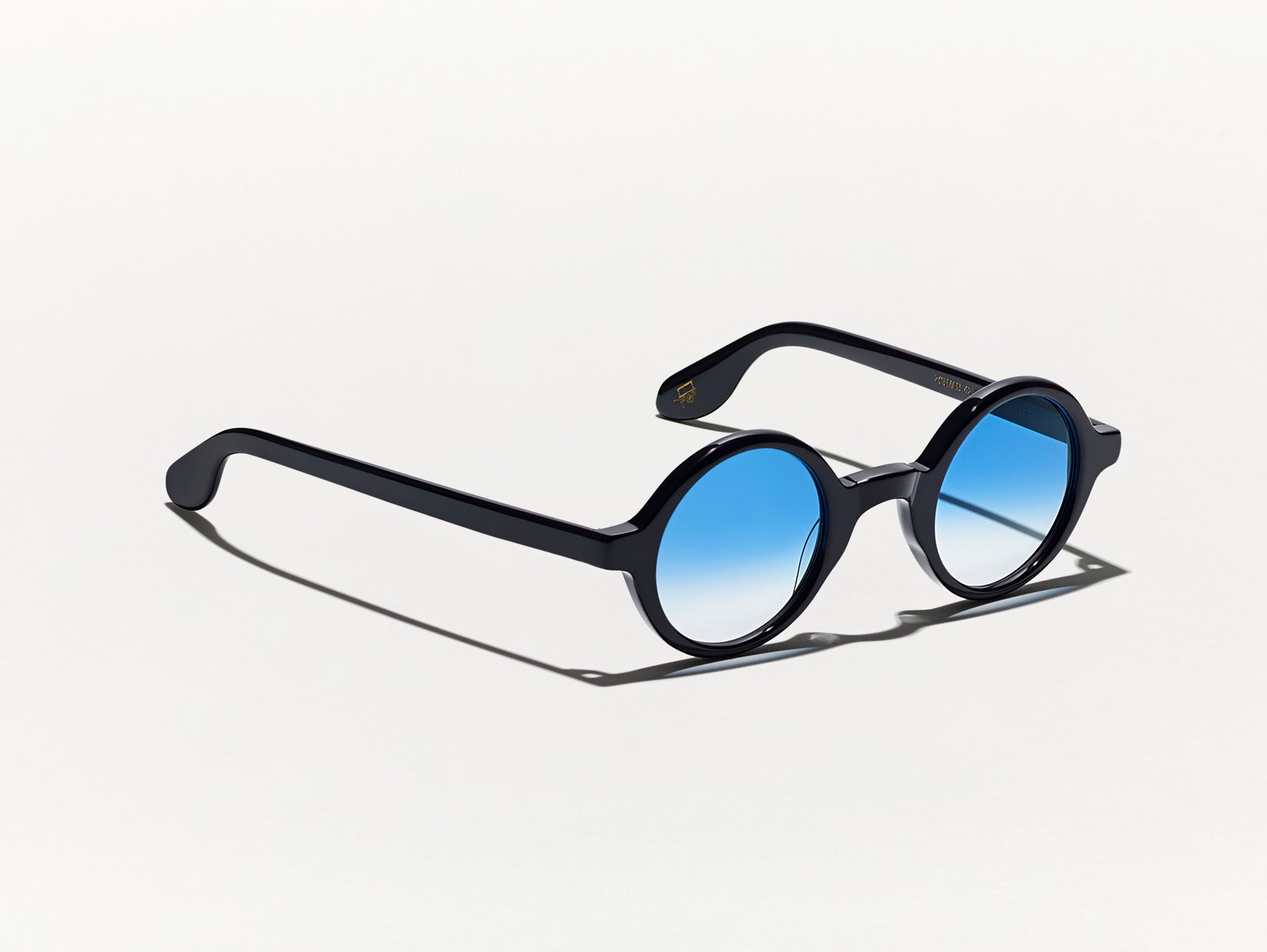 The ZOLMAN in Black with Broadway Blue Fade Tinted Lenses