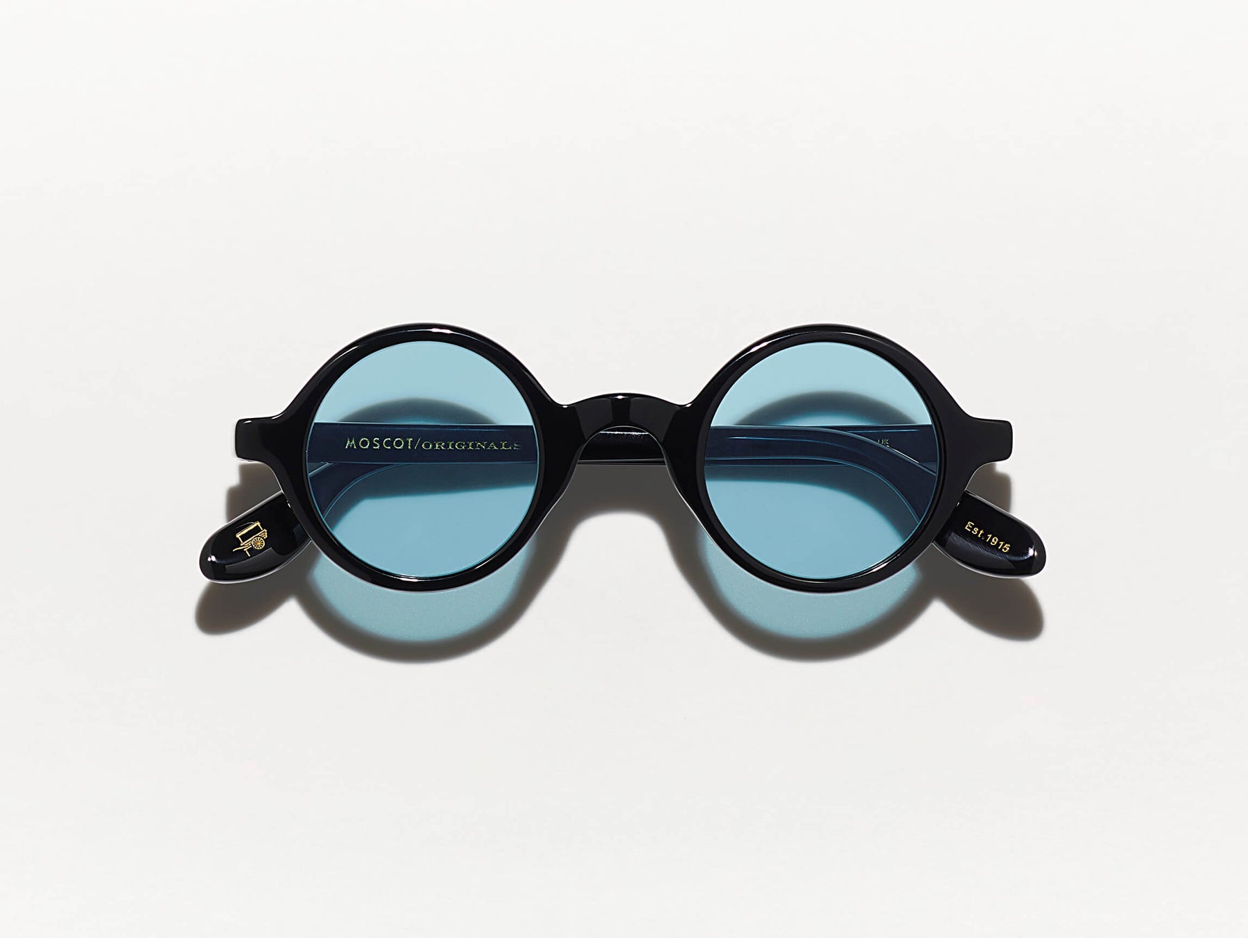 The ZOLMAN SUN in Black with Blue Glass Lenses