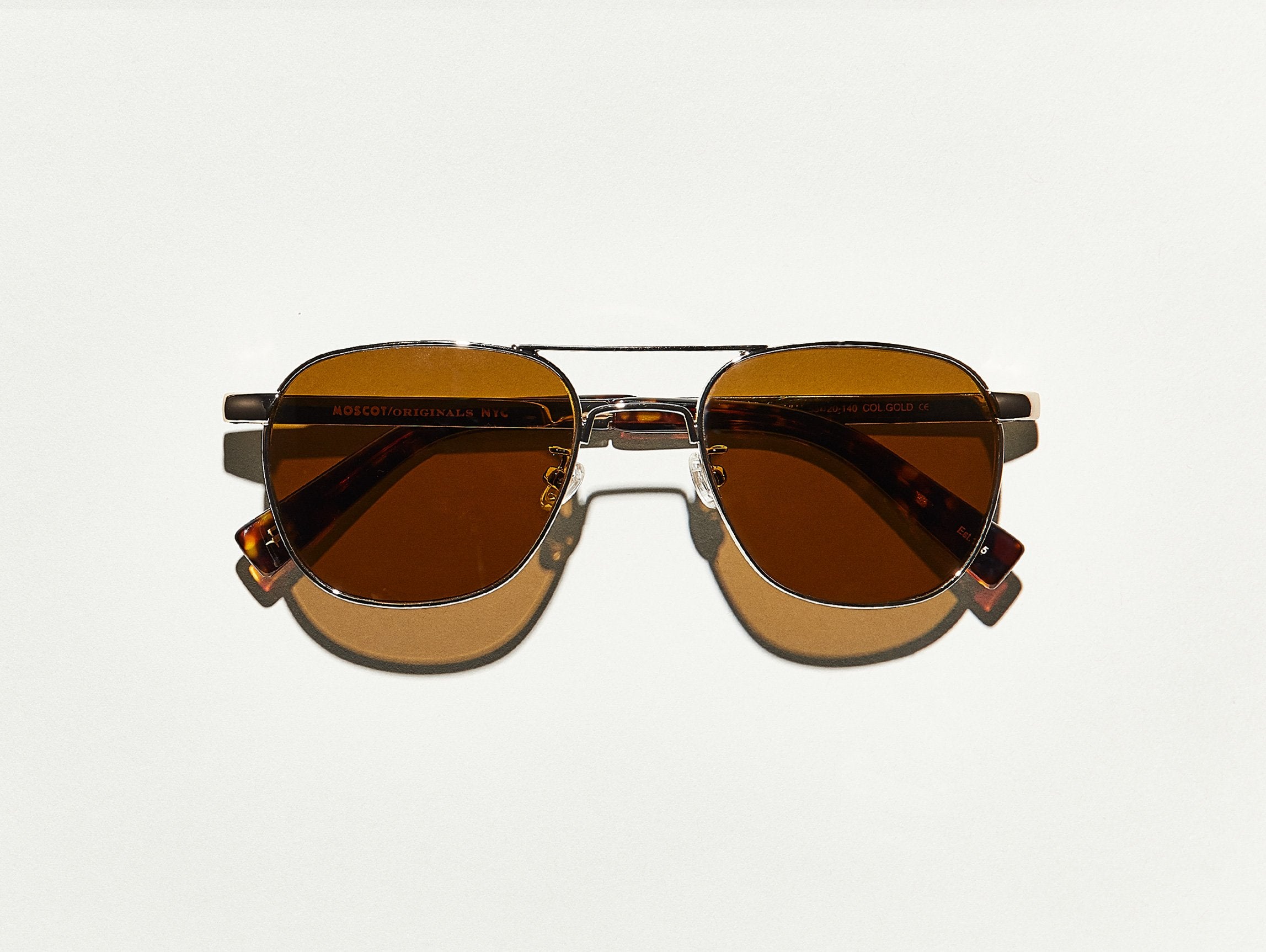 #color_gold | The ZULU SUN in Gold with Cosmitan Brown Glass Lenses
